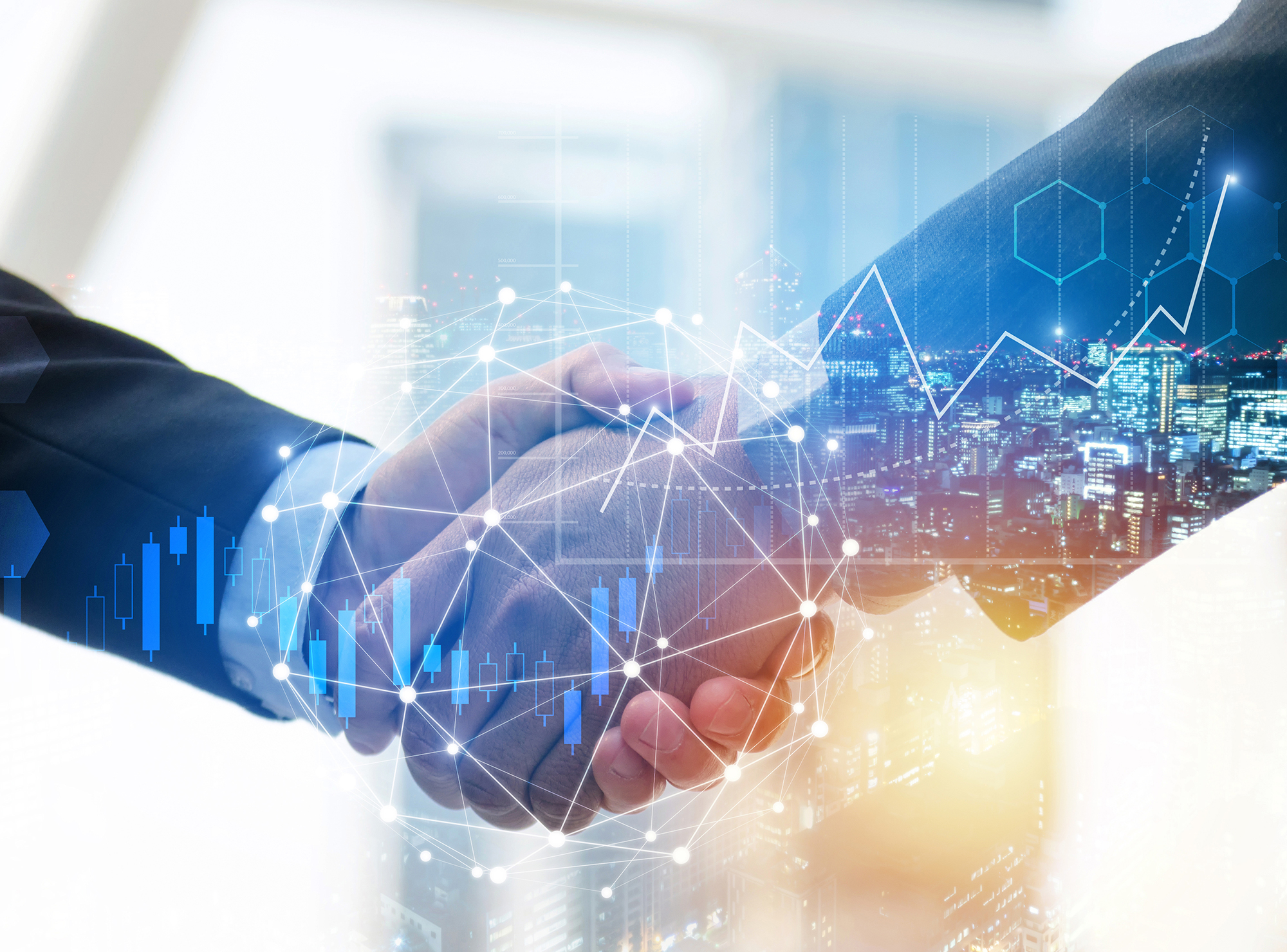 business-men-shaking-hands-with-graphics-overlay-2000x1480
